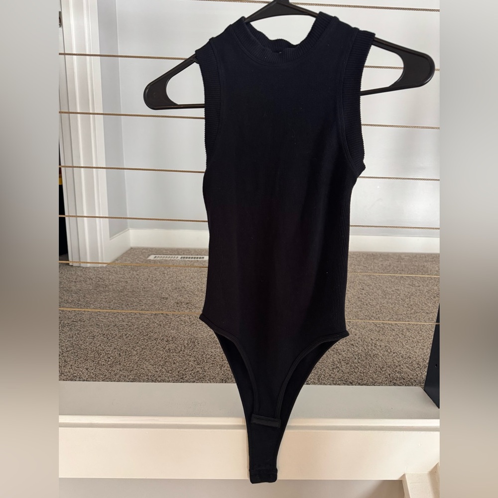 Black Sleeveless Bodysuit with High-Cut Leg